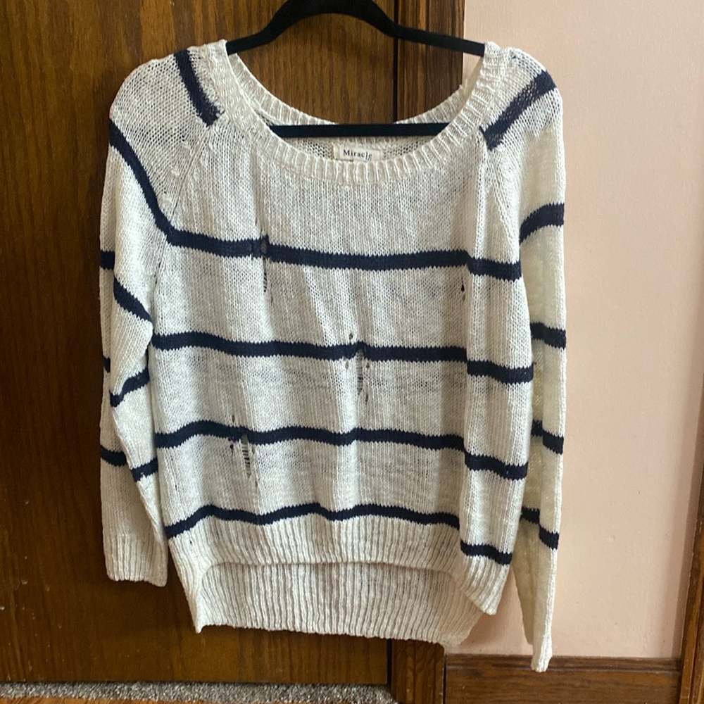 Size medium/large distressed top